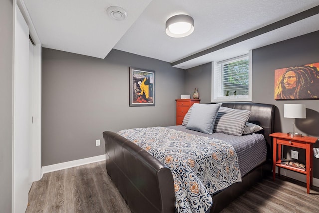 18201 Kathleene Dr, Minnetonka, MN 55345 - bedroom featuring wood finished floors and baseboards