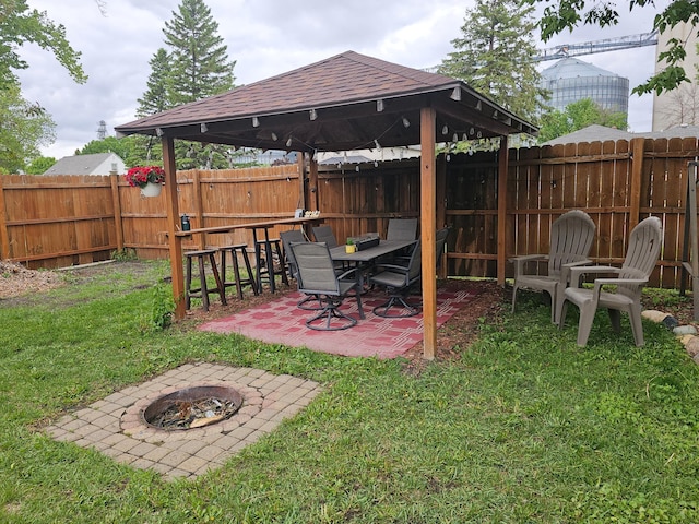 205 2nd Ave W, Lamberton, MN 56152 - view of yard with an outdoor fire pit, a gazebo, and a patio area