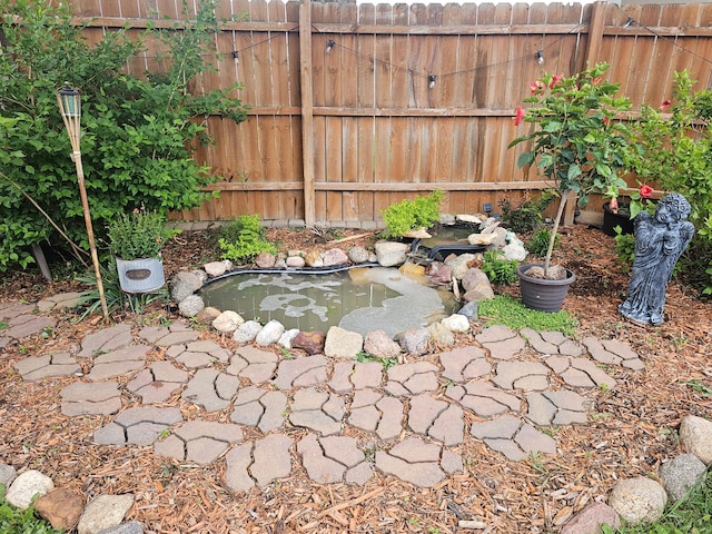 205 2nd Ave W, Lamberton, MN 56152 - view of yard featuring a garden pond