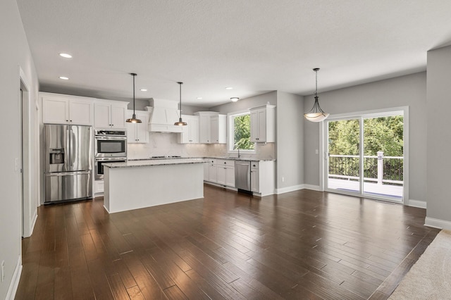 1206 Rosemary Ln, Chaska, MN 55318 - kitchen featuring stainless steel appliances, baseboards, premium range hood, backsplash, and recessed lighting