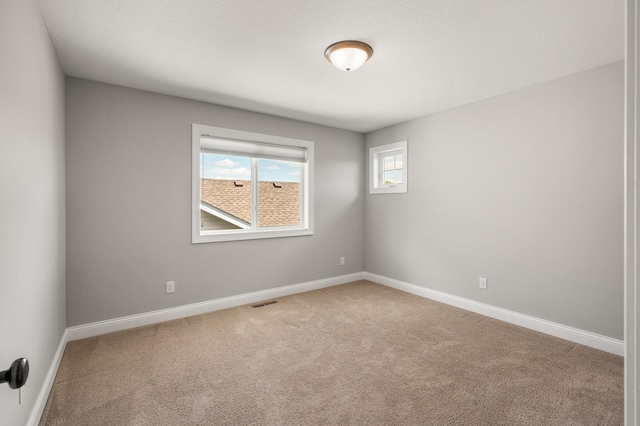1206 Rosemary Ln, Chaska, MN 55318 - empty room with carpet floors and baseboards