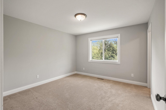 1206 Rosemary Ln, Chaska, MN 55318 - empty room with light colored carpet and baseboards