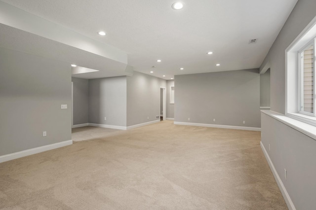 1206 Rosemary Ln, Chaska, MN 55318 - unfurnished room with light colored carpet, recessed lighting, and baseboards