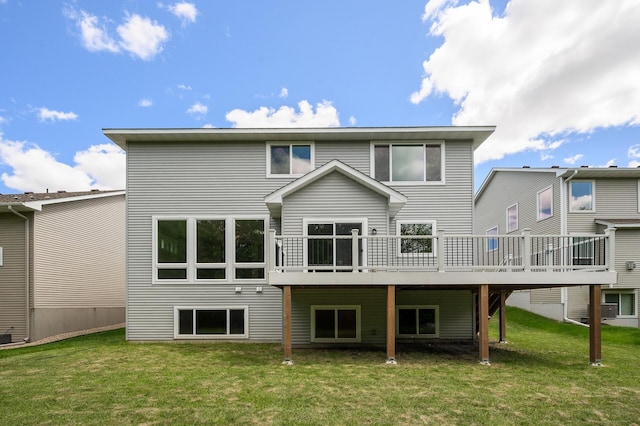 1206 Rosemary Ln, Chaska, MN 55318 - rear view of property featuring a lawn and a wooden deck