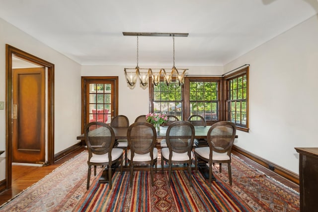 5319 Upton Ave S, Minneapolis, MN 55410 - dining room with wood finished floors and a chandelier
