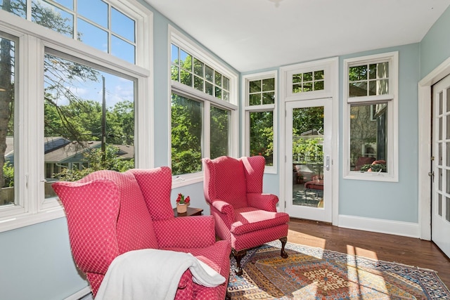 5319 Upton Ave S, Minneapolis, MN 55410 - sunroom featuring wood finished floors and a baseboard heating unit