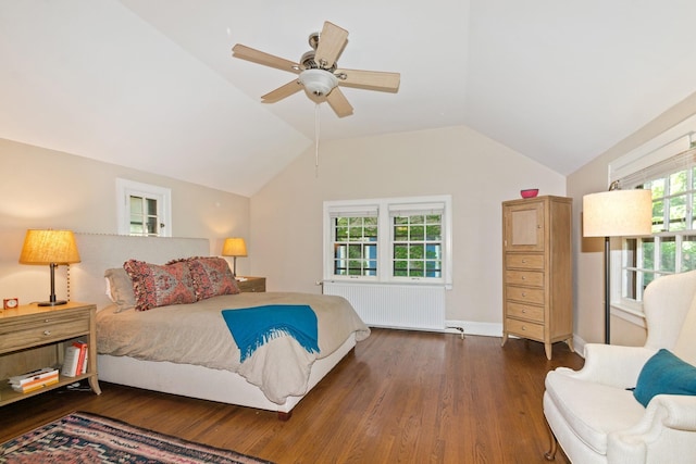 5319 Upton Ave S, Minneapolis, MN 55410 - bedroom featuring radiator heating unit, wood finished floors, vaulted ceiling, and ceiling fan