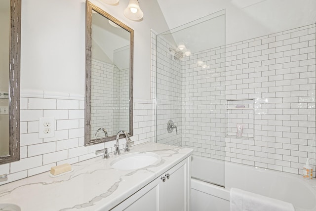 5319 Upton Ave S, Minneapolis, MN 55410 - full bathroom with vanity, tile walls,  shower combination, and a wainscoted wall