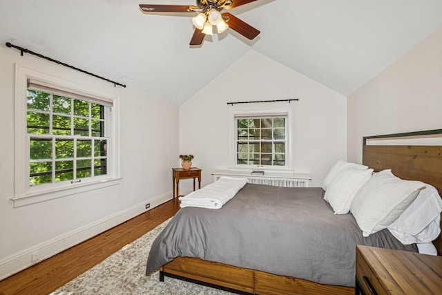 5319 Upton Ave S, Minneapolis, MN 55410 - bedroom featuring wood finished floors, vaulted ceiling, and a ceiling fan