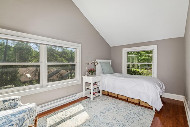 5319 Upton Ave S, Minneapolis, MN 55410 - bedroom featuring a baseboard heating unit, lofted ceiling, and wood finished floors