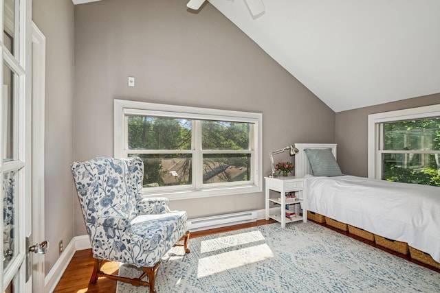 5319 Upton Ave S, Minneapolis, MN 55410 - bedroom with baseboard heating, wood finished floors, lofted ceiling, and a ceiling fan