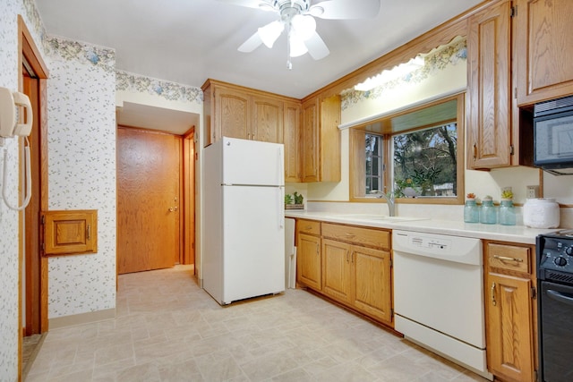 2168 Southwood Dr, White Bear Lake, MN 55110 - kitchen featuring black appliances, wallpapered walls, ceiling fan, and light countertops