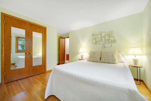 2168 Southwood Dr, White Bear Lake, MN 55110 - bedroom with wood finished floors and baseboards