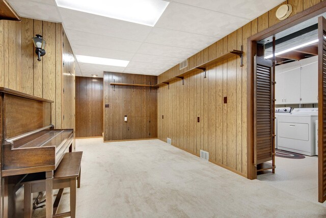 2168 Southwood Dr, White Bear Lake, MN 55110 - finished basement with washing machine and dryer, wood walls, and carpet flooring