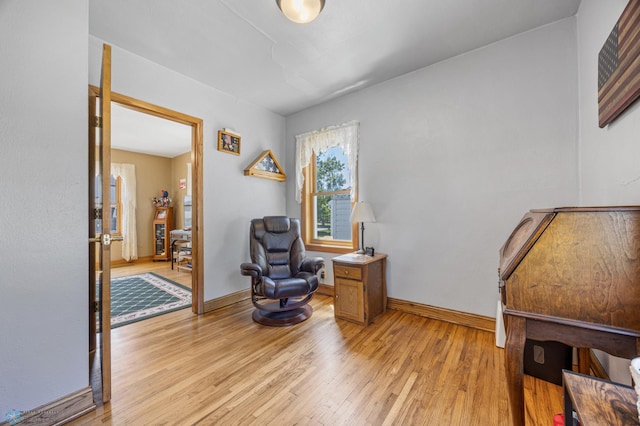 114 2nd Ave E, West Fargo, ND 58078 - sitting room featuring light wood finished floors and baseboards