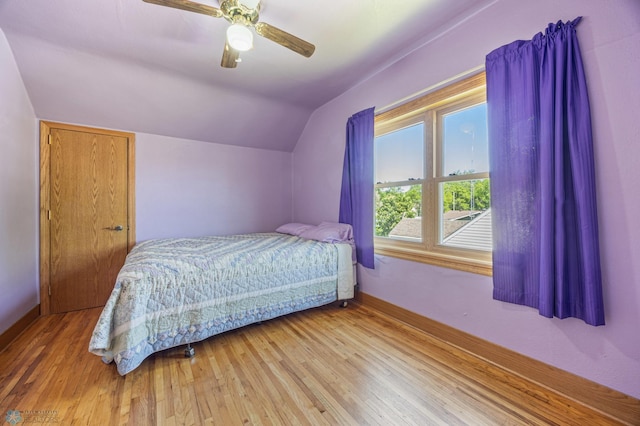 114 2nd Ave E, West Fargo, ND 58078 - bedroom featuring vaulted ceiling, hardwood / wood-style flooring, baseboards, and ceiling fan