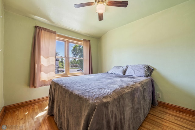 114 2nd Ave E, West Fargo, ND 58078 - bedroom with hardwood / wood-style flooring, baseboards, a ceiling fan, and lofted ceiling