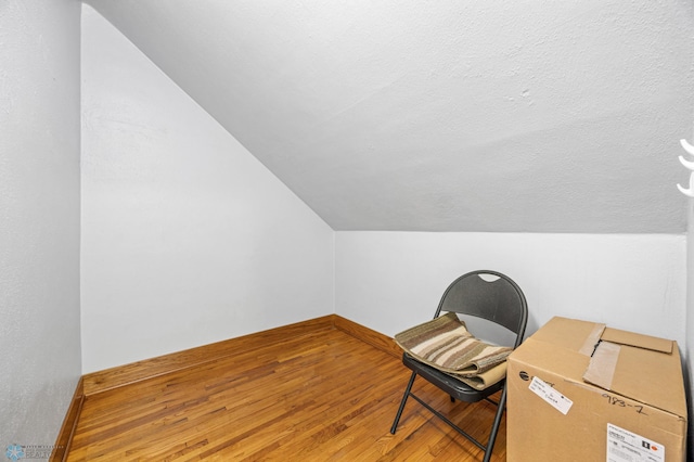 114 2nd Ave E, West Fargo, ND 58078 - office space featuring vaulted ceiling, wood finished floors, and baseboards