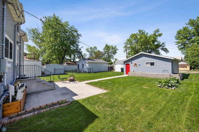 114 2nd Ave E, West Fargo, ND 58078 - view of yard with a patio and an outdoor fire pit