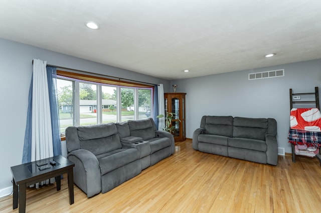 1000 17th St SW, Austin, MN 55912 - living area with wood finished floors, recessed lighting, and baseboards
