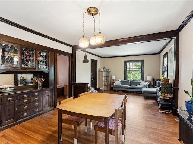 928 Franklin Ter, Minneapolis, MN 55406 - dining space with crown molding and light wood finished floors