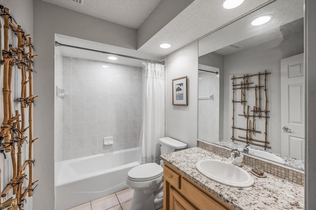 2600 Parkview Ct, White Bear Twp, MN 55110 - full bathroom featuring toilet, tile patterned floors, vanity, shower / bath combo with shower curtain, and a textured ceiling