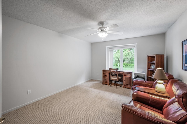 2600 Parkview Ct, White Bear Twp, MN 55110 - office area featuring light carpet, a ceiling fan, baseboards, and a textured ceiling