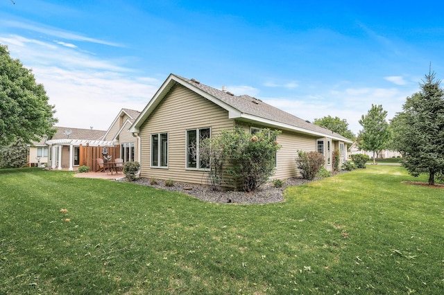 2600 Parkview Ct, White Bear Twp, MN 55110 - view of property exterior with a patio area and a lawn