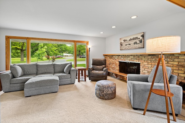 6504 Warren Ave S, Edina, MN 55439 - living area with carpet floors, recessed lighting, and a brick fireplace