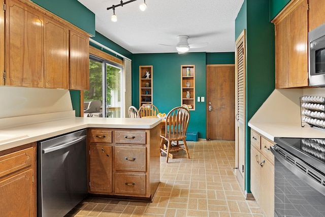 6504 Warren Ave S, Edina, MN 55439 - kitchen featuring stainless steel appliances, light countertops, ceiling fan, a peninsula, and brick patterned floors