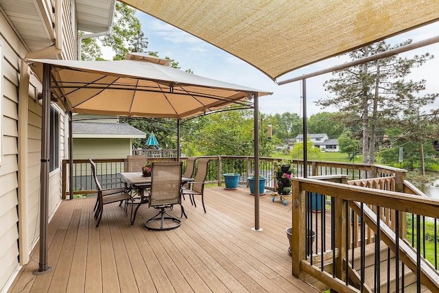 6504 Warren Ave S, Edina, MN 55439 - deck featuring a gazebo and outdoor dining space