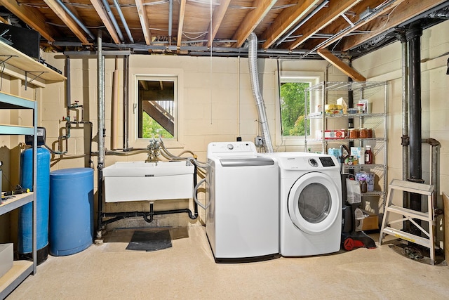 6504 Warren Ave S, Edina, MN 55439 - washroom featuring independent washer and dryer, plenty of natural light, and concrete block wall