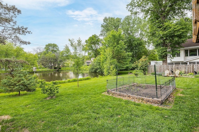 6504 Warren Ave S, Edina, MN 55439 - view of yard with a garden and a water view