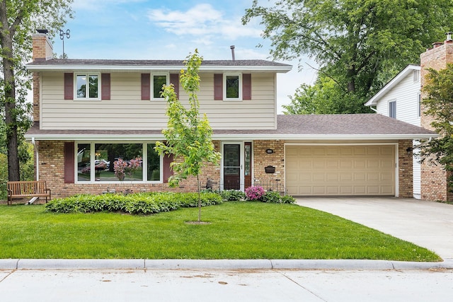 6504 Warren Ave S, Edina, MN 55439 - view of front of property featuring an attached garage, driveway, a chimney, a front yard, and brick siding