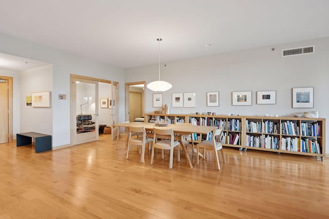 215 10th Ave S Unit 312, Minneapolis, MN 55415 - dining area with wood finished floors