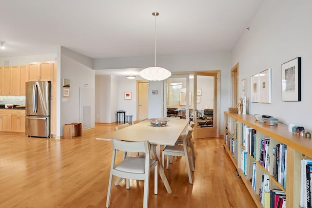 215 10th Ave S Unit 312, Minneapolis, MN 55415 - dining space with light wood finished floors