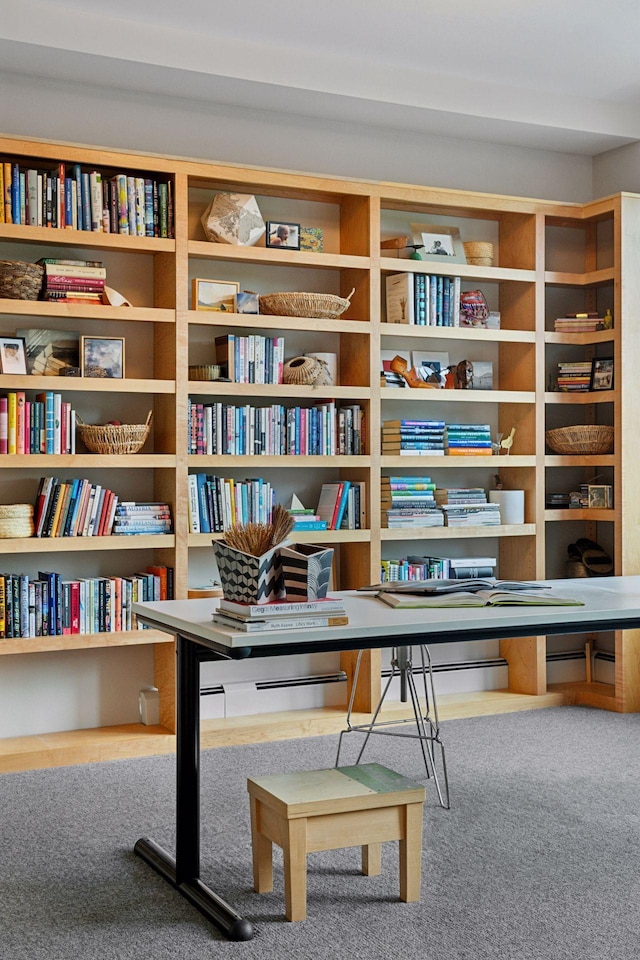 215 10th Ave S Unit 312, Minneapolis, MN 55415 - sitting room with wall of books and carpet floors