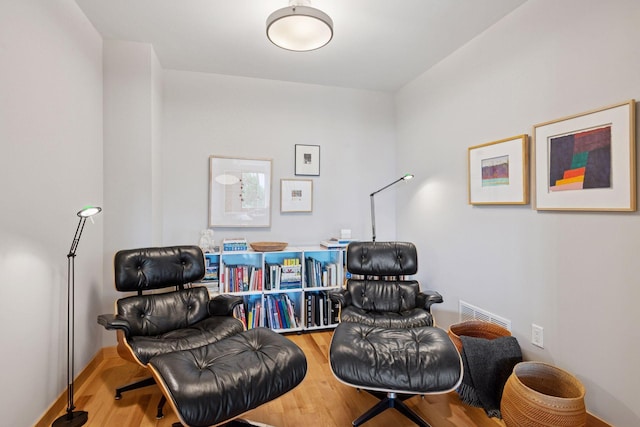 215 10th Ave S Unit 312, Minneapolis, MN 55415 - sitting room with wood finished floors and baseboards