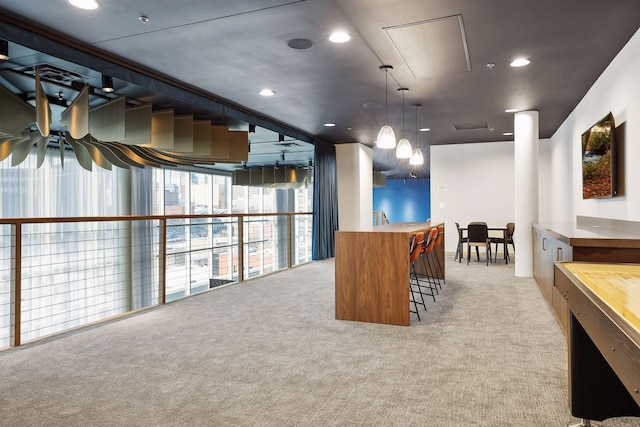 215 10th Ave S Unit 312, Minneapolis, MN 55415 - interior space with light carpet, bar, and recessed lighting