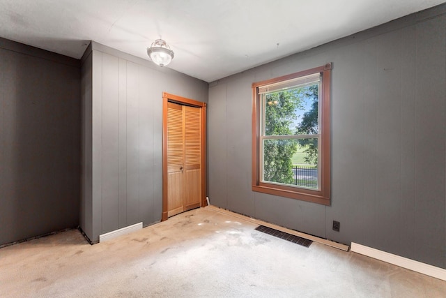39 Magnolia Ave E, Saint Paul, MN 55117 - unfurnished bedroom featuring carpet flooring and a closet