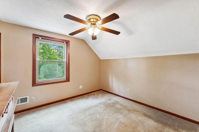 39 Magnolia Ave E, Saint Paul, MN 55117 - bonus room featuring ceiling fan, vaulted ceiling, carpet flooring, baseboards, and a textured ceiling