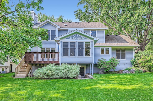 1321 Dallager Ct, Stillwater, MN 55082 - rear view of house with a lawn, a chimney, a wooden deck, and roof with shingles