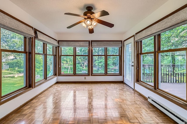 1321 Dallager Ct, Stillwater, MN 55082 - unfurnished sunroom featuring a baseboard radiator, baseboards, and a textured ceiling