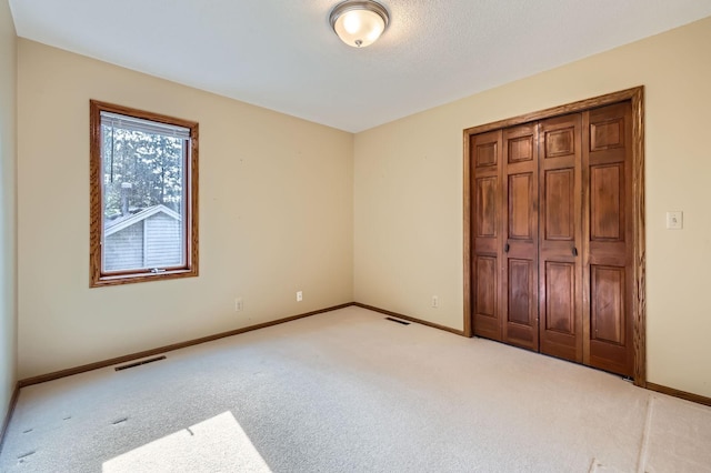 1321 Dallager Ct, Stillwater, MN 55082 - unfurnished bedroom featuring carpet flooring, baseboards, and a closet