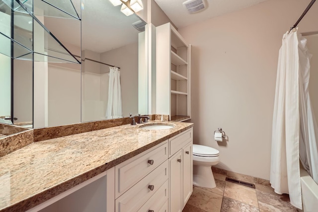 1321 Dallager Ct, Stillwater, MN 55082 - full bathroom with vanity, toilet, baseboards, stone tile flooring, and shower / tub combo