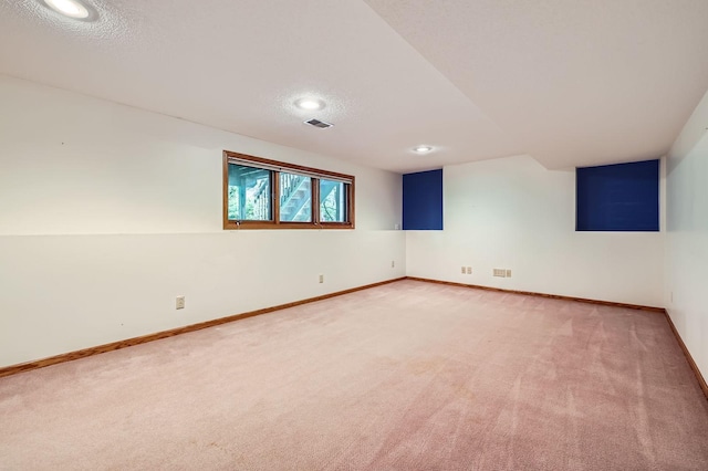 1321 Dallager Ct, Stillwater, MN 55082 - spare room featuring light carpet, baseboards, recessed lighting, and a textured ceiling