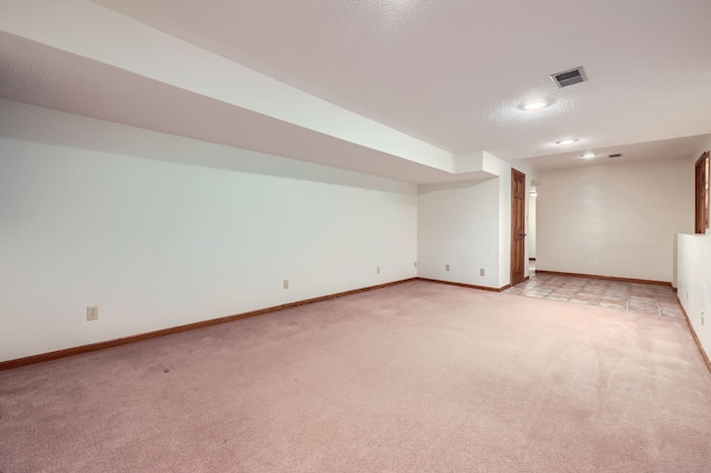 1321 Dallager Ct, Stillwater, MN 55082 - finished below grade area with light carpet, baseboards, a textured ceiling, and recessed lighting