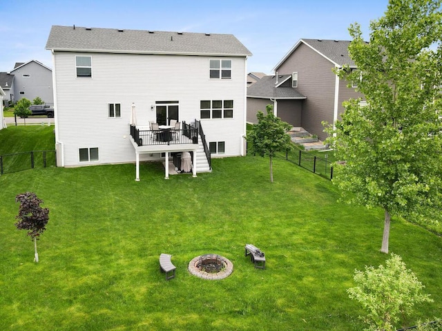 7121 208th St N, Forest Lake, MN 55025 - rear view of property with stairs, a wooden deck, and a fire pit
