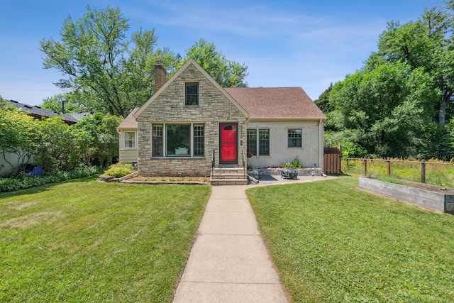 5640 13th Ave S, Minneapolis, MN 55417 - view of front of house with a chimney and stone siding