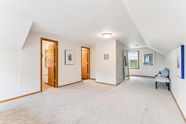 5640 13th Ave S, Minneapolis, MN 55417 - unfurnished room featuring light colored carpet and vaulted ceiling